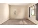Bright bedroom with neutral walls and carpet flooring, offering a cozy and inviting atmosphere at 4682 E Redfield Rd, Gilbert, AZ 85234