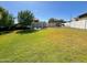 Large backyard with play equipment and a trampoline at 4824 S Brice --, Mesa, AZ 85212