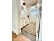 Bathroom featuring a long vanity, black hardware, neutral rug and shower at 4824 S Brice --, Mesa, AZ 85212