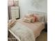 Comfortable bedroom with decorative pillows and wall art, creating a cozy and inviting space at 4824 S Brice --, Mesa, AZ 85212
