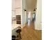 Hallway view from kitchen features hardwood floors and white trim at 4824 S Brice --, Mesa, AZ 85212