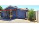 Quaint back patio with seating under a wooden shade structure at 5539 E Dragoon Ave, Mesa, AZ 85206