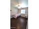 A well lit bedroom offers a warm and restful ambiance at 5539 E Dragoon Ave, Mesa, AZ 85206