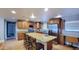 Modern kitchen with granite island, stainless steel appliances, and custom cabinetry, perfect for cooking at 5539 E Dragoon Ave, Mesa, AZ 85206