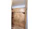 Tiled shower with built-in shelves and a mosaic tile border at 5539 E Dragoon Ave, Mesa, AZ 85206