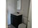 Clean bathroom featuring a modern vanity and toilet at 5916 W Pierce St, Phoenix, AZ 85043