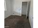 Cozy bedroom with plush carpet, a closet, and natural light at 5916 W Pierce St, Phoenix, AZ 85043