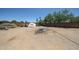 Spacious backyard with gravel landscaping, perimeter brick wall, and minimal foliage at 6249 E Larkspur Dr, Scottsdale, AZ 85254