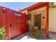 Inviting entrance featuring a colorful gate leading to a cozy front porch at 6319 W Mercer Ln, Glendale, AZ 85304