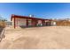 The backyard features a covered patio area with plenty of room at 6521 W Flower St, Phoenix, AZ 85033