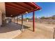 This is a backyard with a covered patio and ample space at 6521 W Flower St, Phoenix, AZ 85033