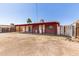A spacious backyard featuring a covered patio area with ample space at 6521 W Flower St, Phoenix, AZ 85033