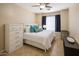 Comfortable bedroom with a queen size bed, side tables and lamps at 6610 E University Dr # 127, Mesa, AZ 85205