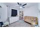 Bedroom with natural light, crib, and storage at 6721 E Mcdowell Rd # B309, Scottsdale, AZ 85257