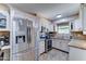 Stylish kitchen featuring stainless steel appliances, granite countertops, and classic cabinetry at 6721 E Mcdowell Rd # B309, Scottsdale, AZ 85257