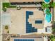 Bird's eye view of home with solar panels, backyard oasis with pool, and patio area perfect for outdoor living at 6967 W Irma Ln, Glendale, AZ 85308