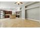 Open kitchen with stainless steel appliances, a stone island, and abundant cabinet space at 6967 W Irma Ln, Glendale, AZ 85308