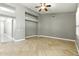 Spacious living room features tile floors and great natural light at 6967 W Irma Ln, Glendale, AZ 85308