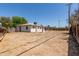 A spacious backyard with a patio awaits, offering endless possibilities at 716 S Lewis --, Mesa, AZ 85210
