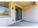 Covered patio area with outdoor access, featuring a sliding glass door at 7423 S 28Th Pl, Phoenix, AZ 85042