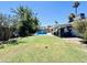 Relax in this backyard with a covered patio and refreshing pool at 8343 E Edward Ave, Scottsdale, AZ 85250