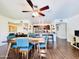Open-concept dining area seamlessly connecting to the kitchen and living spaces at 8343 E Edward Ave, Scottsdale, AZ 85250