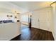 Welcoming entryway featuring hardwood floors and plantation shutters at 8343 E Edward Ave, Scottsdale, AZ 85250
