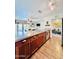 Well-equipped kitchen with a spacious island, stainless steel appliances, and ample cabinet space at 8343 E Edward Ave, Scottsdale, AZ 85250