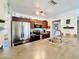 Spacious kitchen showcasing stainless steel appliances, abundant cabinetry, and a convenient layout at 8343 E Edward Ave, Scottsdale, AZ 85250