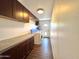 Functional laundry room with washer, dryer, ample storage, and convenient access to the exterior at 8343 E Edward Ave, Scottsdale, AZ 85250