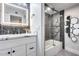 Modern bathroom with stylish vanity, LED mirror, and shower with tub at 8618 E Via De Encanto --, Scottsdale, AZ 85258