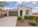 Charming single-story home with desert landscaping and a two-car garage at 9155 W Minnezona Ave, Phoenix, AZ 85037