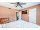 Bedroom with bed, TV and ensuite access at 9421 E Calle De Valle Dr, Scottsdale, AZ 85255