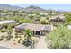 Stunning home with solar panels and desert landscaping in a mountain community at 9421 E Calle De Valle Dr, Scottsdale, AZ 85255
