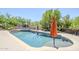 Beautiful backyard pool with an outdoor kitchen area at 9421 E Calle De Valle Dr, Scottsdale, AZ 85255