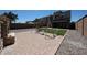 Backyard featuring a playground and artificial grass at 10036 E Naranja Ave, Mesa, AZ 85209