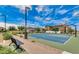 A community basketball court with benches, landscaping, and nearby residential homes at 10036 E Naranja Ave, Mesa, AZ 85209