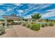 A gazebo sits on a community walking path with picnic tables at 10036 E Naranja Ave, Mesa, AZ 85209