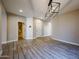 Bright living room featuring tile flooring and recessed lighting creating a modern, open atmosphere at 10036 E Naranja Ave, Mesa, AZ 85209
