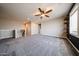Spacious loft with carpet, neutral walls, access to stairs, and open layout at 10036 E Naranja Ave, Mesa, AZ 85209