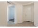Bright hallway that flows into other parts of the home, showcasing the tile flooring at 10348 E Tupelo Ave, Mesa, AZ 85212