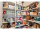 Walk-in pantry with ample shelving for food and storage at 10348 E Tupelo Ave, Mesa, AZ 85212