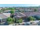 Beautiful aerial view of a home with well-maintained landscaping and a charming neighborhood at 10650 E Palladium Dr, Mesa, AZ 85212