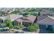 Great aerial view of home highlighting lush landscaping and the inviting facade at 10650 E Palladium Dr, Mesa, AZ 85212
