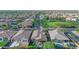 Beautiful aerial view of a well manicured neighborhood, walking paths, and pool at 10650 E Palladium Dr, Mesa, AZ 85212