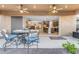 Covered patio with fan and view of an open concept living space at 10650 E Palladium Dr, Mesa, AZ 85212