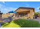 The patio includes a covered area, outdoor seating, and a view of the landscaped backyard, perfect for relaxing or entertaining at 10650 E Palladium Dr, Mesa, AZ 85212