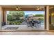 Beautiful backyard with pool, fireplace, and comfortable seating at 10650 E Palladium Dr, Mesa, AZ 85212