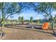 A community space provides a fire pit and chairs for outdoor gatherings at 10650 E Palladium Dr, Mesa, AZ 85212