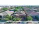 Street view of a beautiful home featuring an attached garage and lovely landscaping at 10650 E Palladium Dr, Mesa, AZ 85212